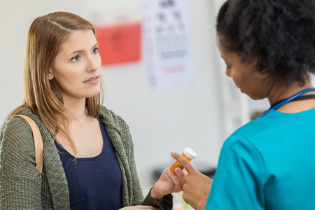 Women getting prescription.